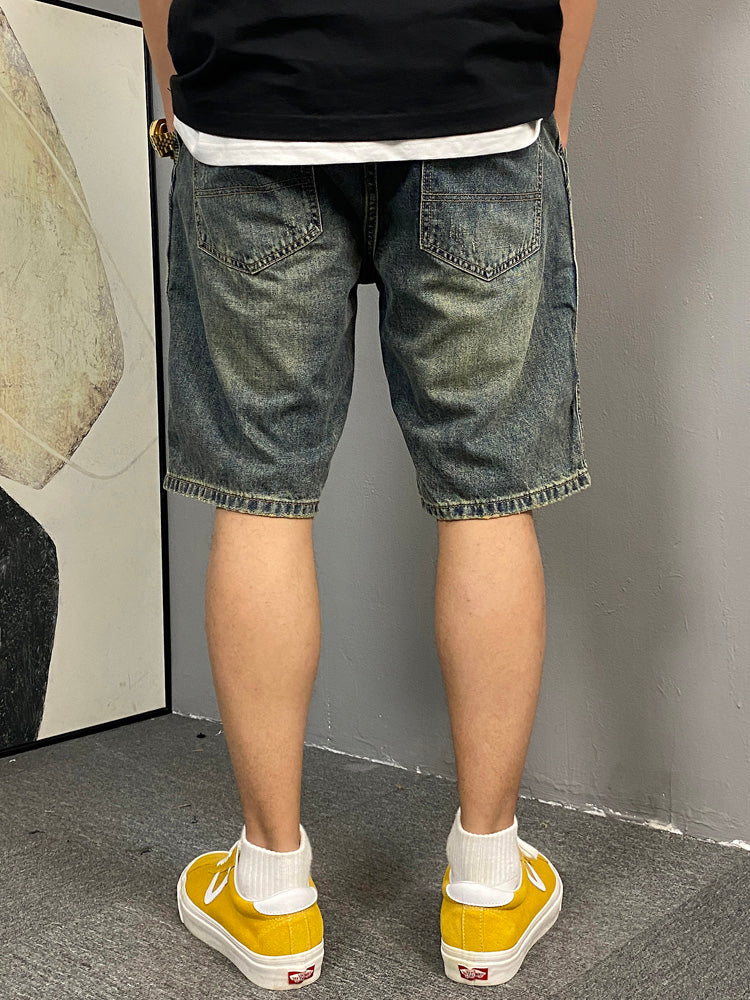 Shorts estivi uomo in denim colore fango stile urbano strappato